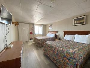 Postel nebo postele na pokoji v ubytování Island View Motel + 37 fotografií