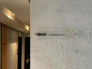 Hôtel Vendôme Douala的证书、奖牌、标识或其他文件