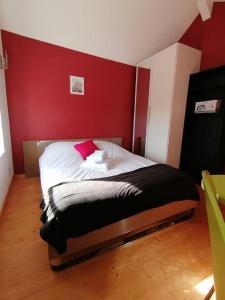 Posteľ alebo postele v izbe v ubytovaní Immeuble Meroux Moval