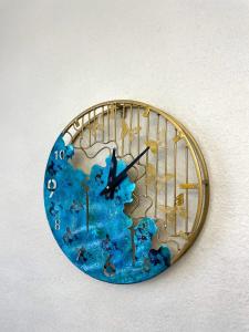 a clock with a map of the world on a wall at Style Home Buzovna in Baku