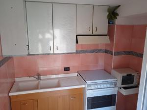 A kitchen or kitchenette at Rifugio Fulieri in Salento