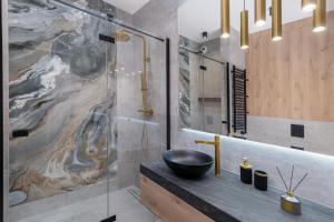Kúpeľňa v ubytovaní Apartament w centrum Krakowa 109