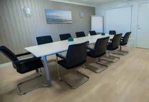 The business area and/or conference room at Gardermoen Hotel Bed & Breakfast