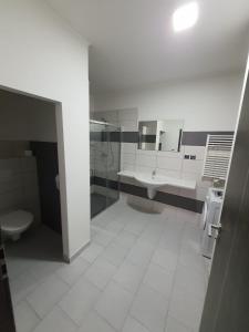 Koupelna v ubytování Penzion TOŠA