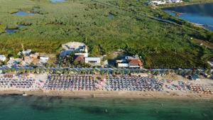 an aerial view of a beach with a crowd of people at Hotel Amantia in Orikum