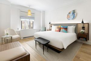 A bed or beds in a room at The James New York - NoMad