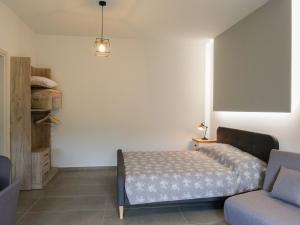 Llit o llits en una habitació de Sisaion Suites - Live the Cretan Hospitality