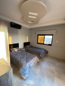 Ένα ή περισσότερα κρεβάτια σε δωμάτιο στο Villa Jana Chalet