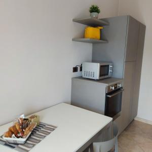 Кухня или мини-кухня в Attico Guest House
