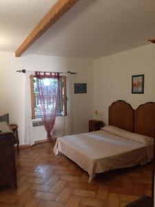 Postel nebo postele na pokoji v ubytování Agriturismo Iacchelli Armando B&B