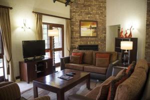 Zona de estar de Kruger Park Lodge Unit No 615 with Private Pool