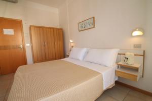 Postel nebo postele na pokoji v ubytování Hotel Soave