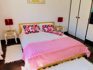 Säng eller sängar i ett rum på Casa do Trevo