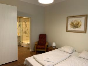 Postel nebo postele na pokoji v ubytování Guesthouse Jakob Lenz