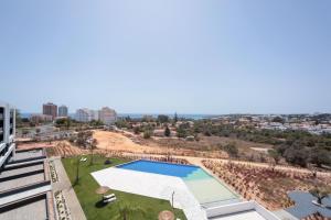 Bazén v ubytování Luxury apartments with stunning sea views nebo v jeho okolí