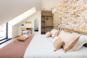 Katil atau katil-katil dalam bilik di Pomme de Reinette