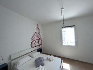 Postel nebo postele na pokoji v ubytování B&B EVO Nardò