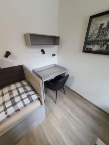 Posteľ alebo postele v izbe v ubytovaní Penzion TOŠA