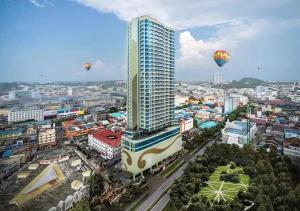 an aerial view of a city with hot air balloons at Family room at Apartemen Formosa Residence Nagoya Batam by Wiwi in Nagoya