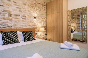 Postel nebo postele na pokoji v ubytování Archontiko Epirus 1