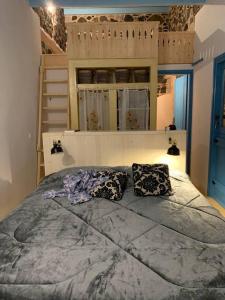 Ein Bett oder Betten in einem Zimmer der Unterkunft Traumhaus Nisyros