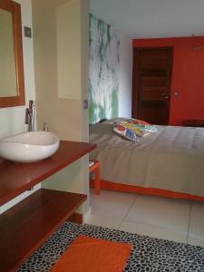 Postel nebo postele na pokoji v ubytování Aluna Ecolodge