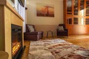 Posedenie v ubytovaní Central Design Apartment