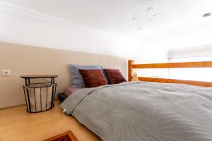 Posteľ alebo postele v izbe v ubytovaní Central Design Apartment