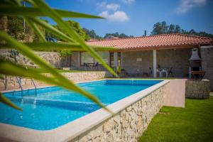 La alberca dentro o cerca de DreamVille- Casa da Pedral