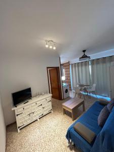 Televízia a/alebo spoločenská miestnosť v ubytovaní El Olivar Corralejo Beach
