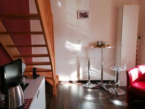 Posedenie v ubytovaní Immeuble Meroux Moval