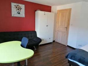 Posedenie v ubytovaní Immeuble Meroux Moval