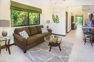 Istumisnurk majutusasutuses Tropical Paradise Villa - Beautiful Pool, Surrounded by Nature and Wildlife!