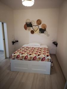 Residenza "Il Vico" tesisinde bir odada yatak veya yataklar