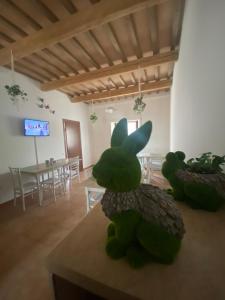 A television and/or entertainment centre at B&B I Giardini