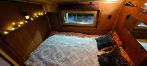 Cama o camas de una habitación en Pirts Rozēni