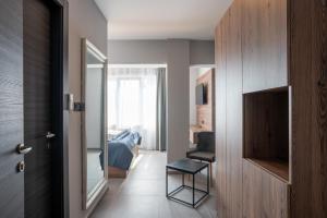 Televisor o centre d'entreteniment de "Echo" B&B rooms, boutique beach hotel