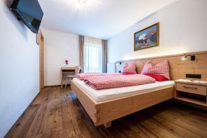 Posteľ alebo postele v izbe v ubytovaní Gasthof Bauhof
