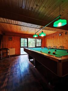 a billiard room with a pool table in it at Cabana Brazilor in Campina