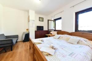 Postel nebo postele na pokoji v ubytování Guest House Vučeta
