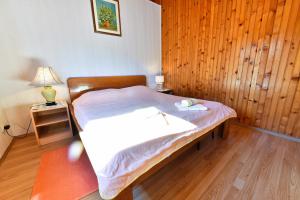Postel nebo postele na pokoji v ubytování Guest House Vučeta