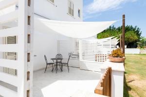 Balkón nebo terasa v ubytování La Casa sul Faro