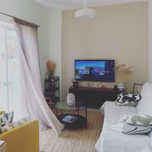 TV a/nebo společenská místnost v ubytování Graecus House