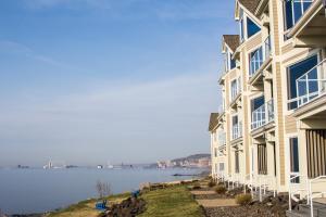 a large building with a view of the water at Beacon Pointe on Lake Superior in Duluth