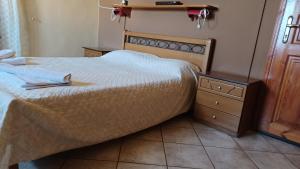A bed or beds in a room at Island house in Elika - Marathias