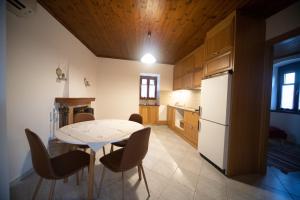 A kitchen or kitchenette at Casa de la Vita