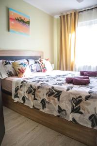 Ένα ή περισσότερα κρεβάτια σε δωμάτιο στο Apartments Relax