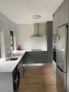 A kitchen or kitchenette at Villa May en Riegu Vidiago Llanes