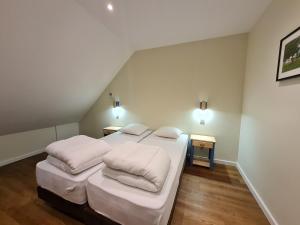 Posteľ alebo postele v izbe v ubytovaní Le Faubourg - Gîte et chambres d'hôte