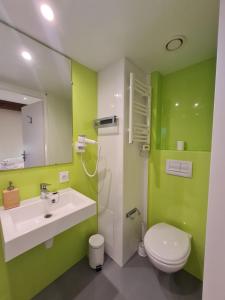 Kúpeľňa v ubytovaní Le Faubourg - Gîte et chambres d'hôte